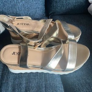 Never worn platform gold and white shoes!